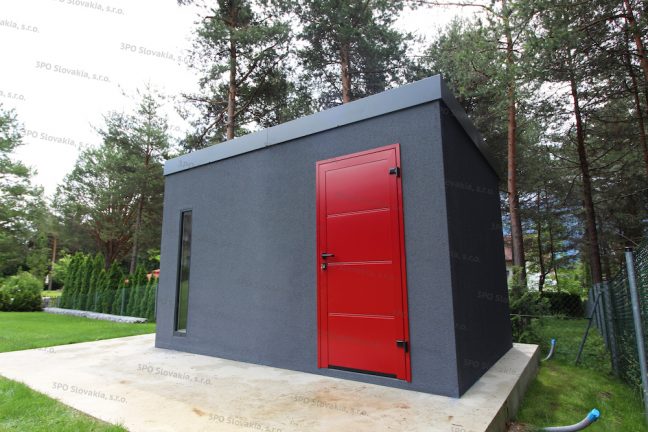 Montovaný záhradný domček v tmavo-sivej omietke s červenými dverami Hormann