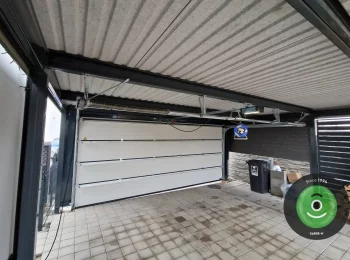 Strešná krytina DRIPSTOP na prístrešku s garážovou bránou